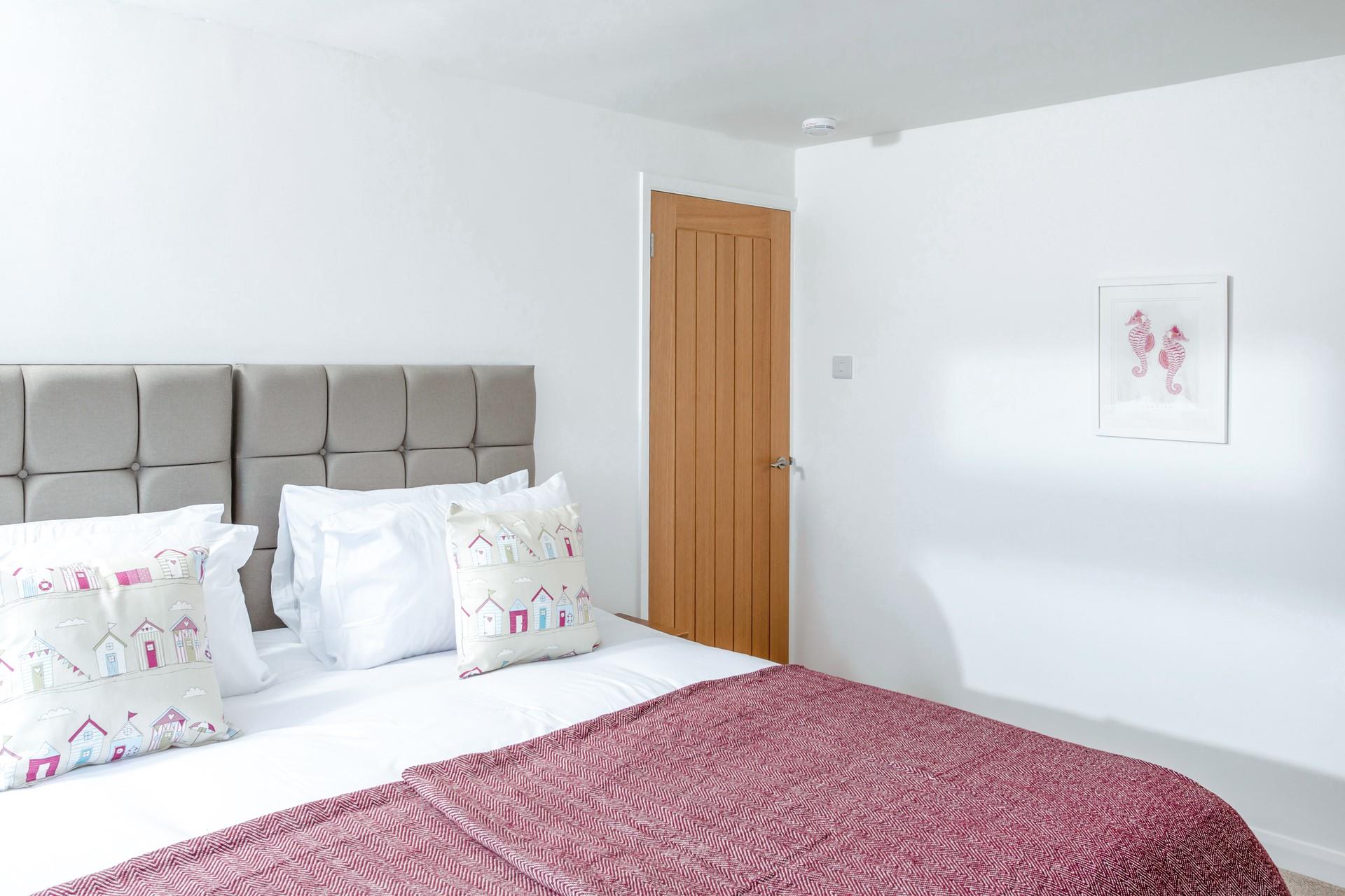 Lovely seaside decor gives a nod to the beachside location.