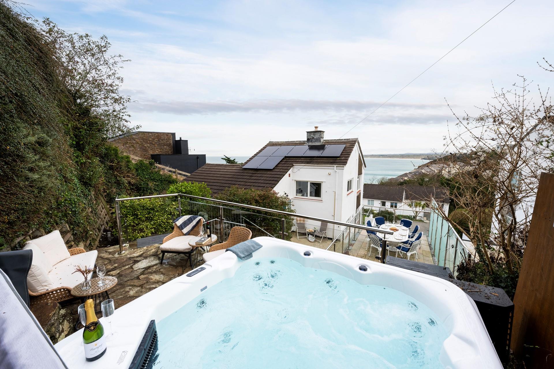Dip into the hot tub and enjoy the views!