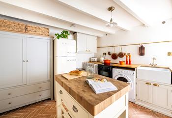The classic country-style kitchen is perfectly equipped for cooking up a storm.