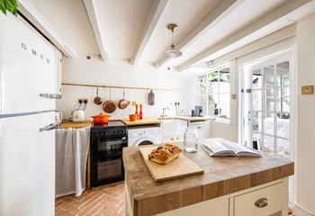 Cook a tasty breakfast to set yourself up for the day in the charming kitchen.