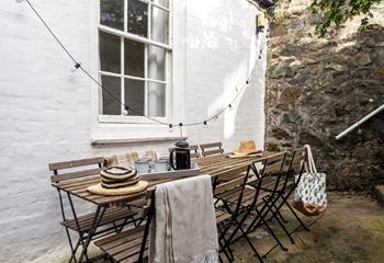 Pour yourself a glass of prosecco to sip as the sun comes down in the courtyard.