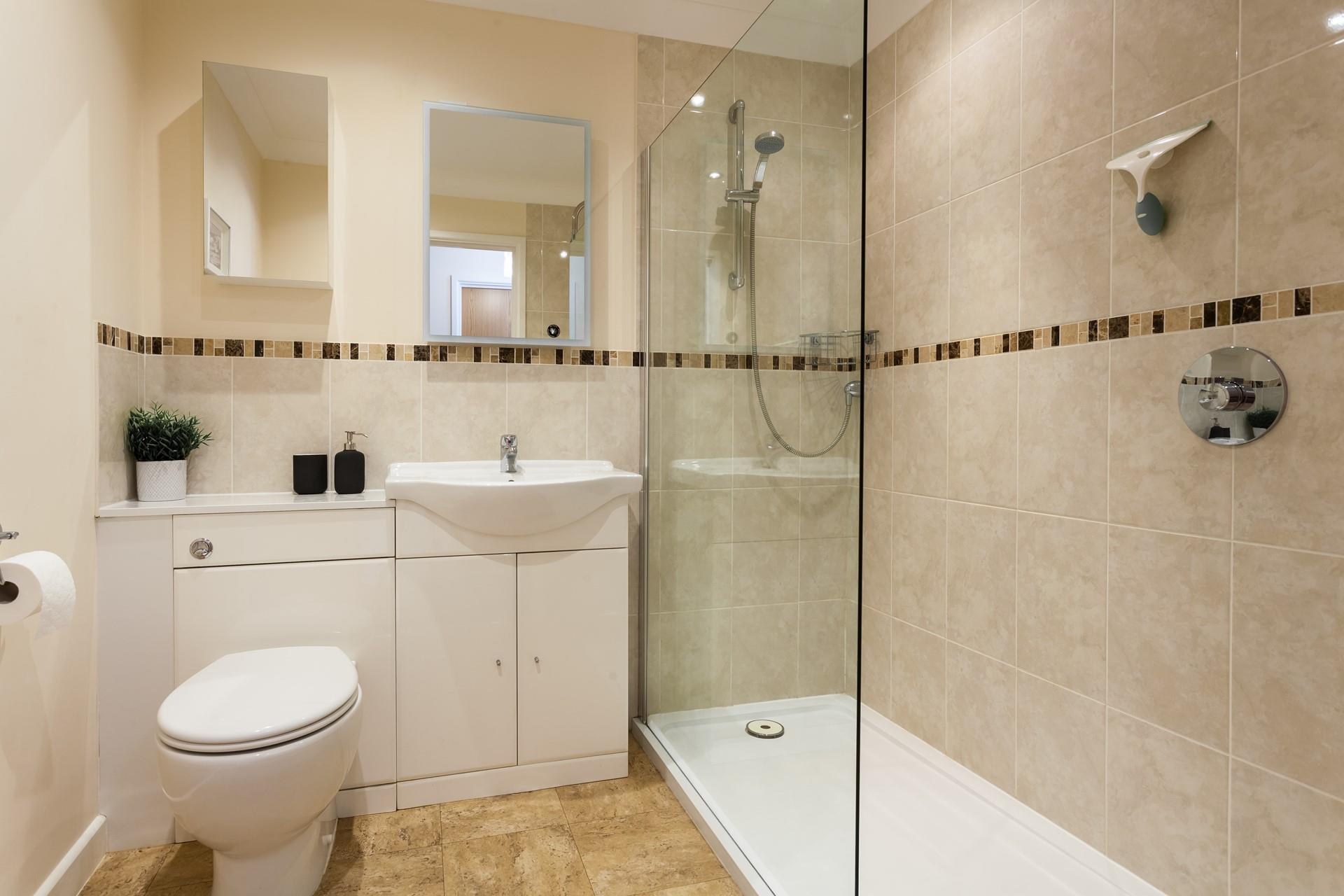 Wash off sandy toes in the shower after a fun-filled day on the beach.