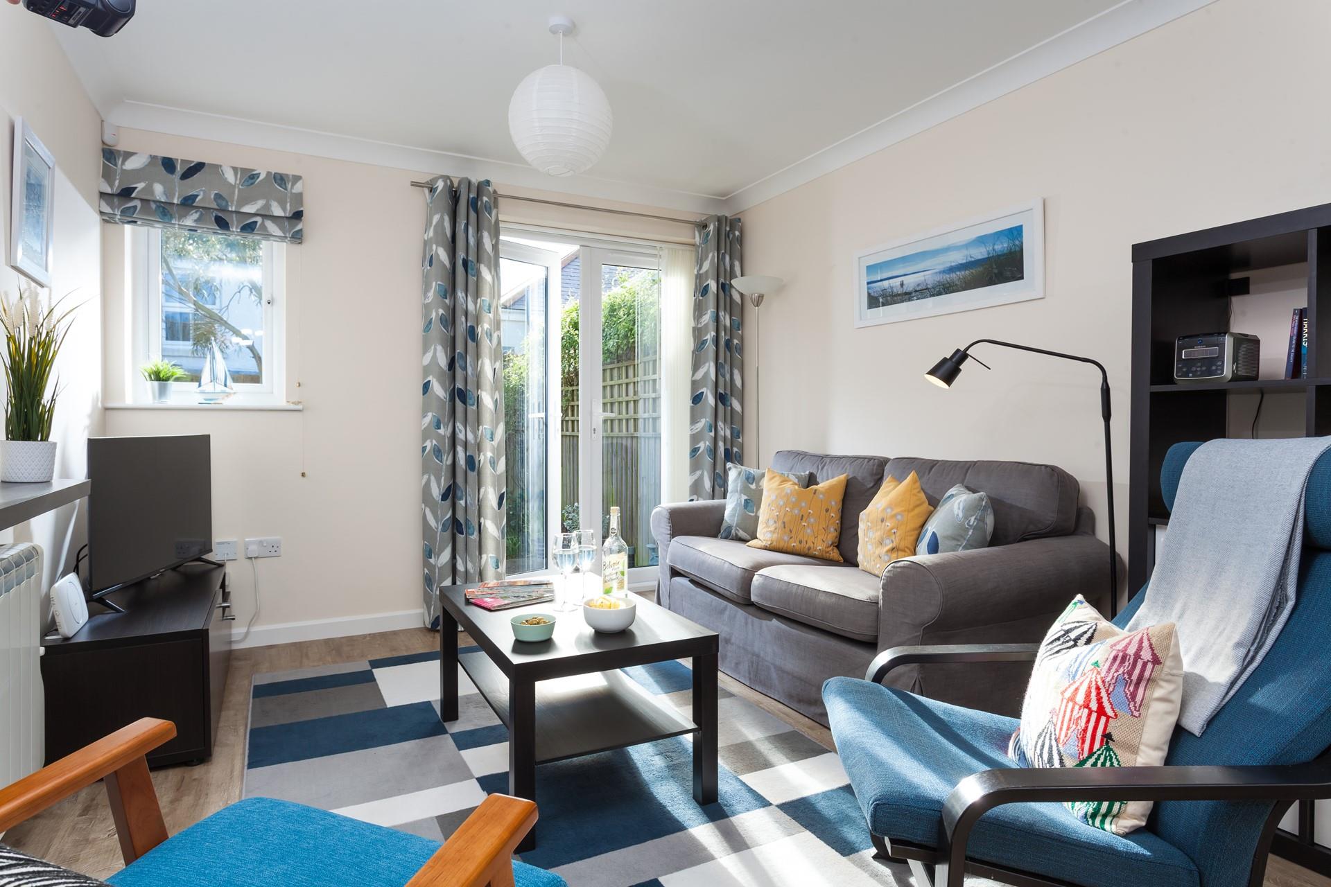 Spacious and homely, the sitting room is the perfect space to unwind with the family around you.