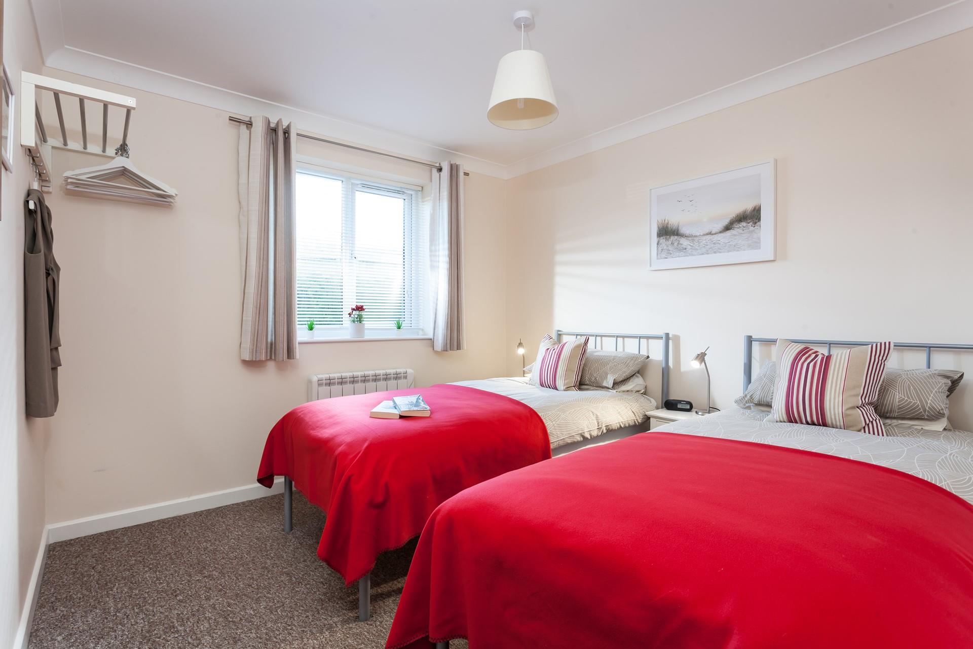 The twin beds are perfect for adults or children to enjoy a relaxing night's slumber.