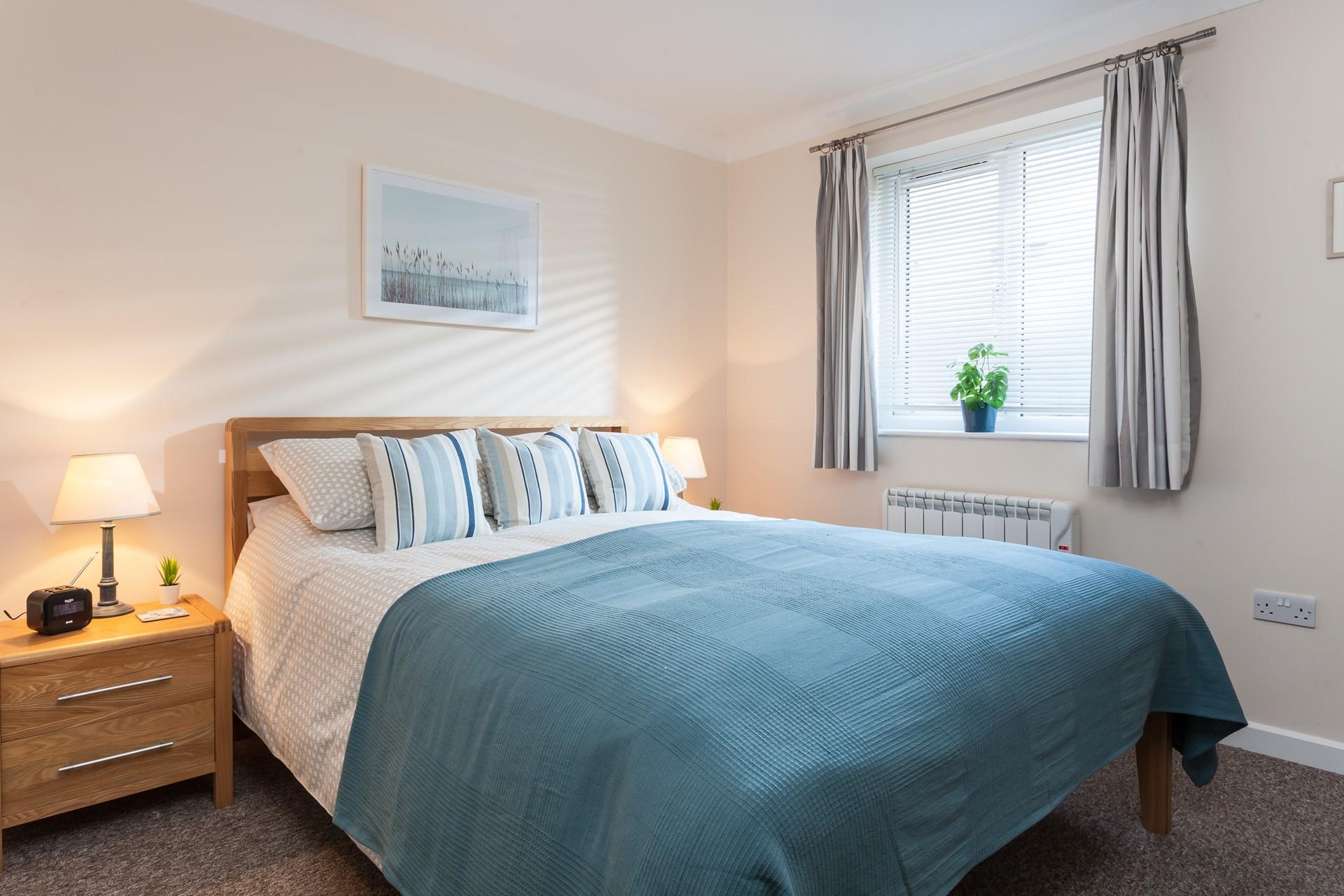 Soft sheets and a king size bed ensure a dreamy night's sleep.