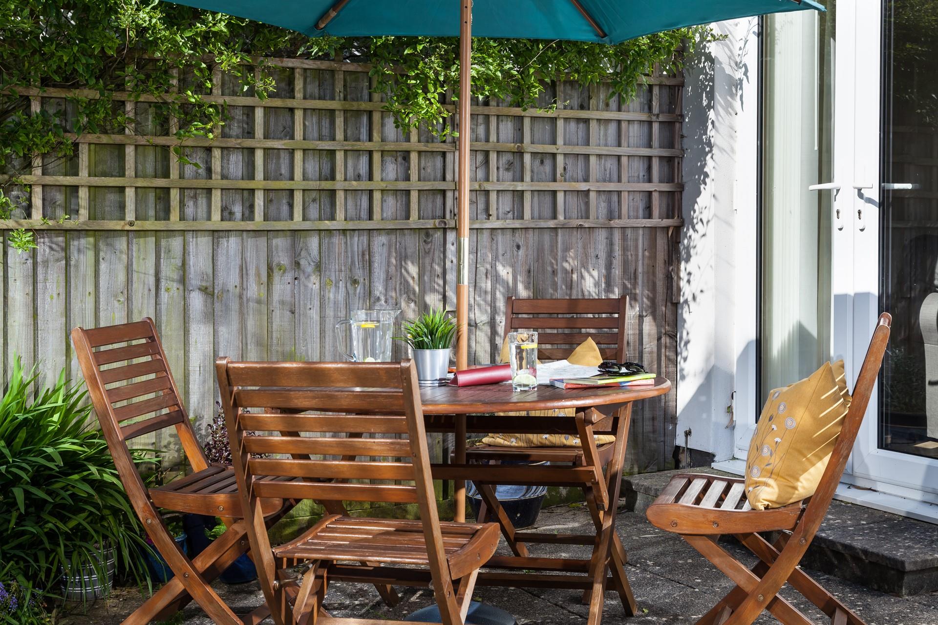 Pour a glass of something cold and relax and unwind in the garden.