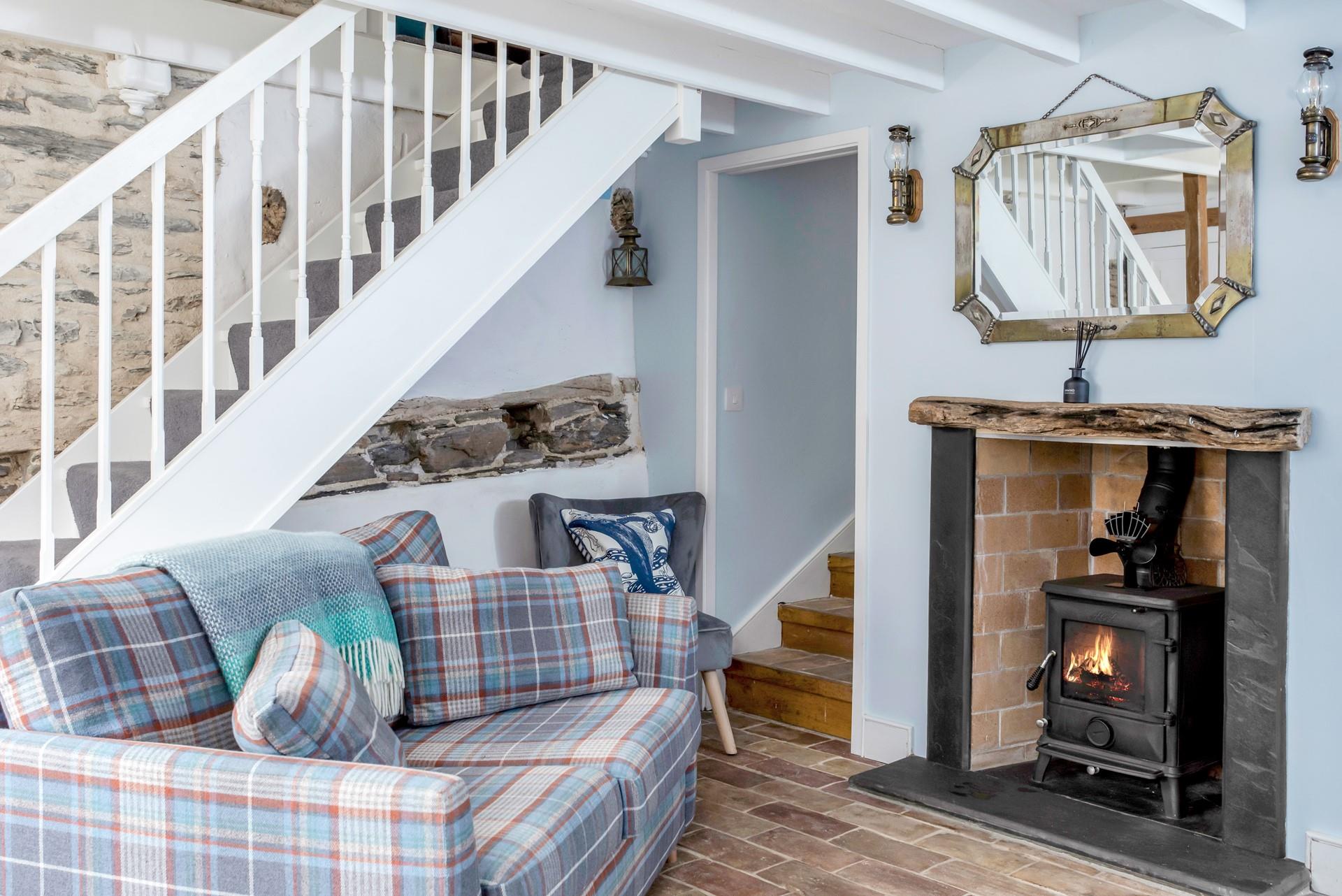 Exposed stonework and rustic features make this cottage a cosy base to return to.