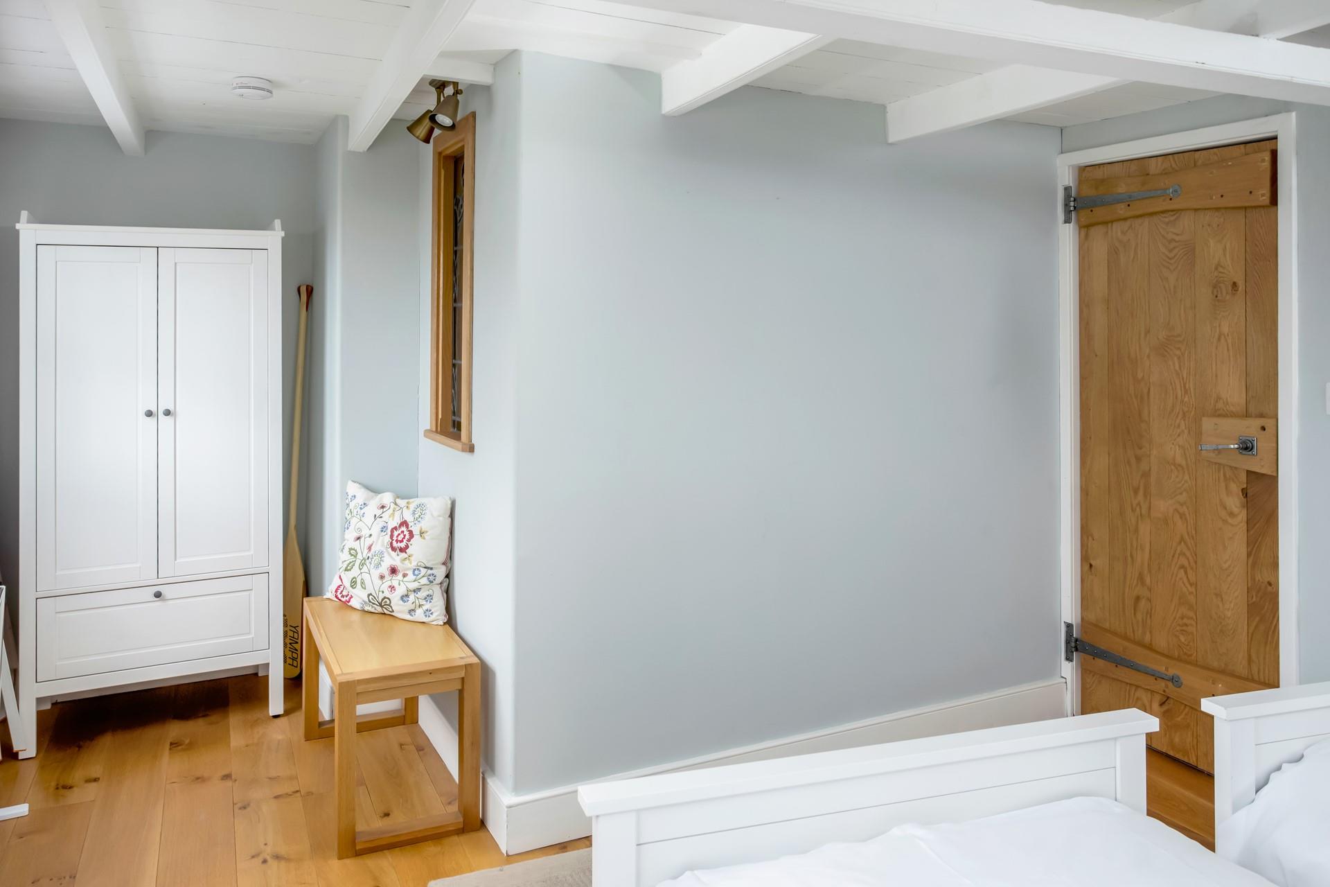 The spacious and light bedroom 1 offers a relaxing night's sleep.