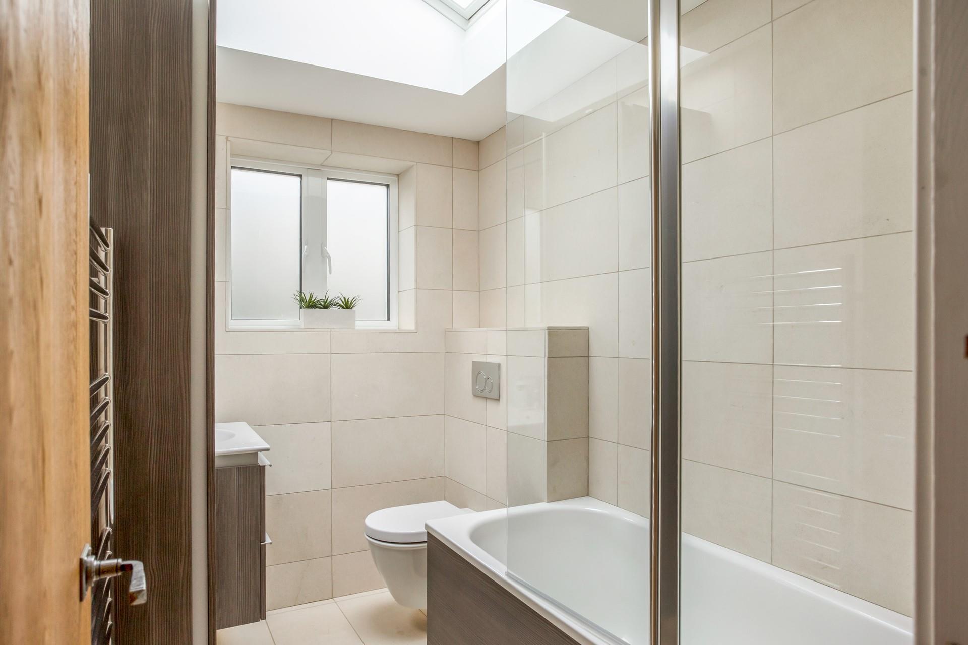 Run a bath and unwind in the bubbles after a day of exploring the south coast on foot.