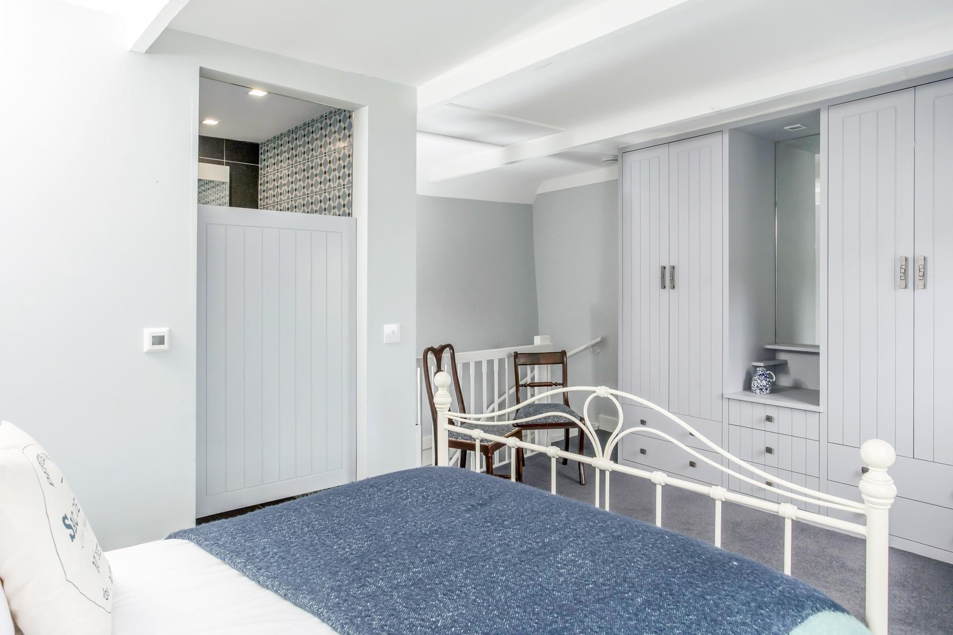 Get ready for the day in the en suite shower room.