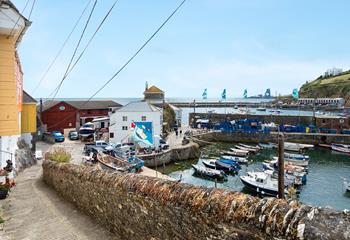 Step out the door onto the harbour for a stroll around the village.