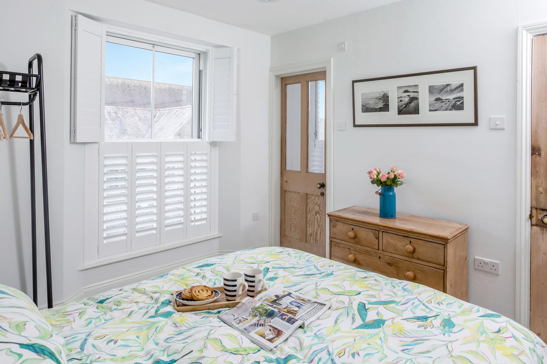 Bedroom 1 has a spacious king size bed and en suite for getting ready in the morning.