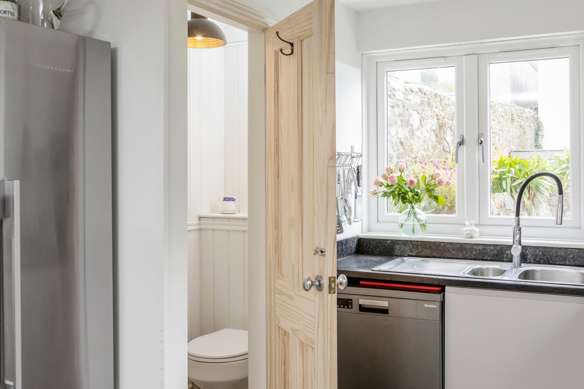 There is an additional WC and basin downstairs.