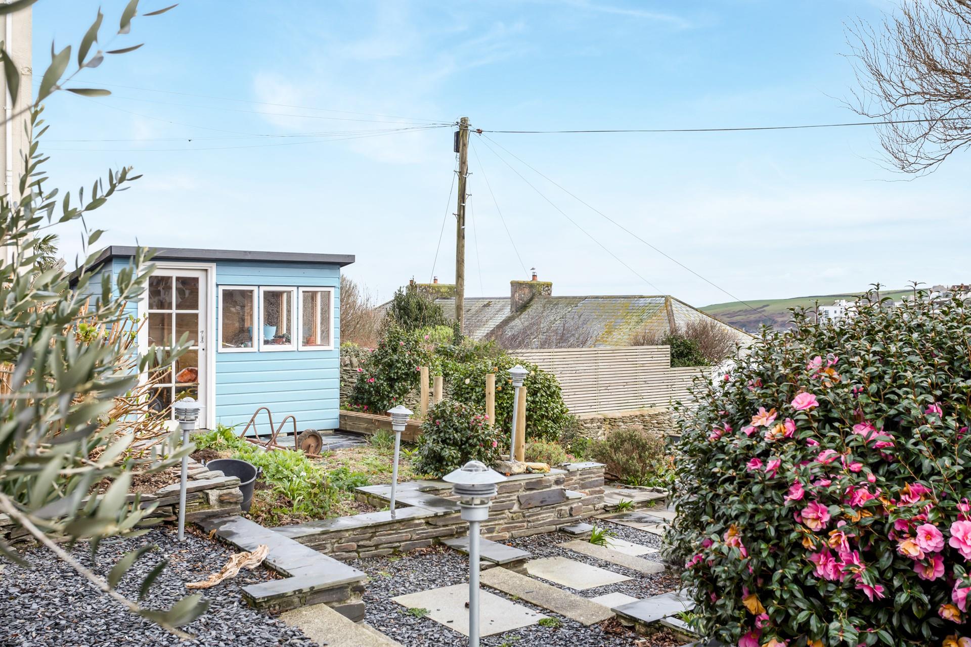 As well as the balcony, there is a terraced garden with additional seating.