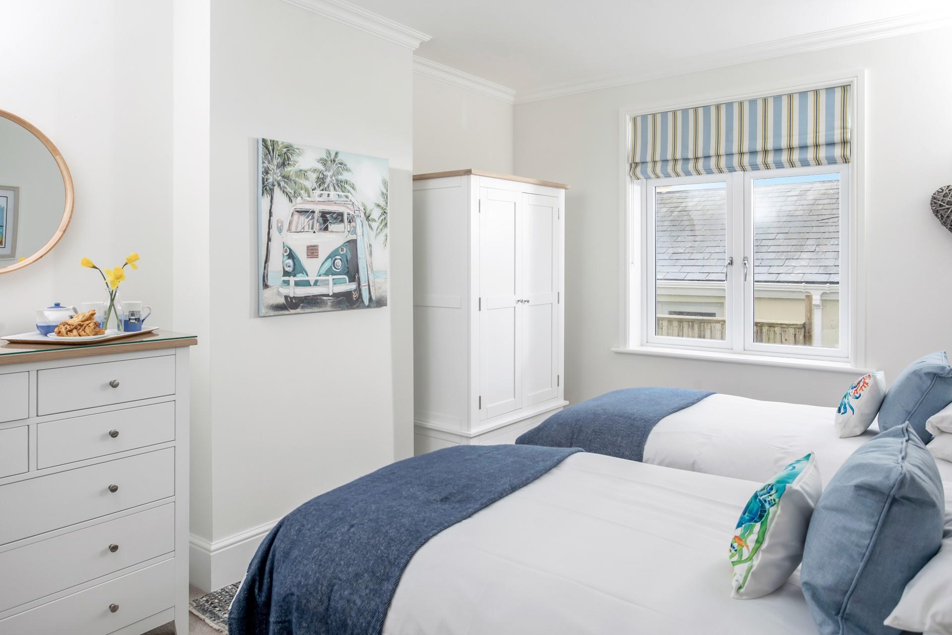 The twin beds are perfect for children or adults to enjoy a relaxing night's sleep.