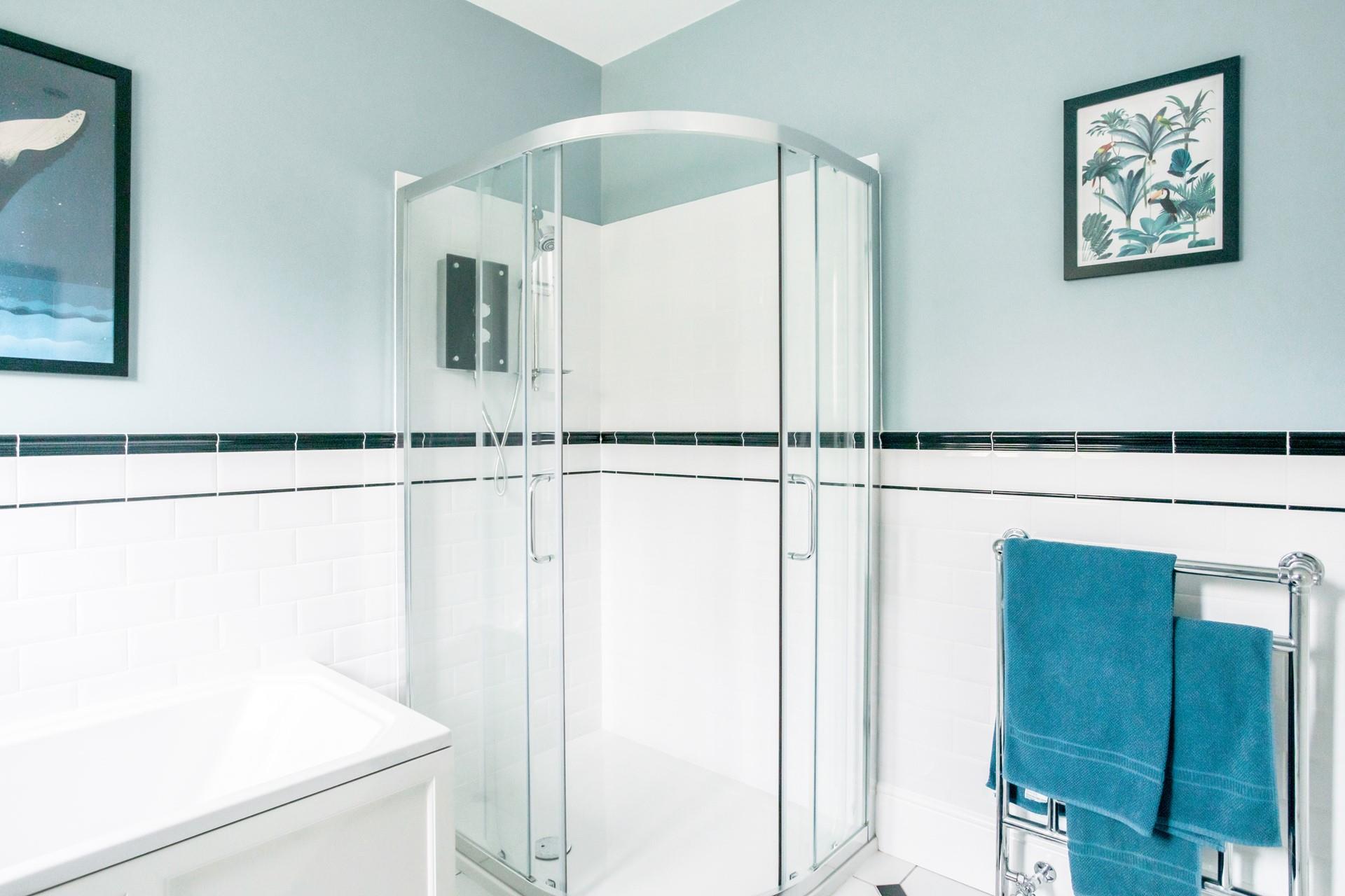 Step out of the shower to fresh fluffy towels from the heated towel rail.