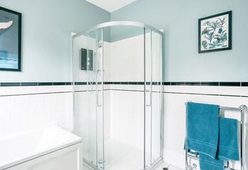 Step out of the shower to fresh fluffy towels from the heated towel rail.