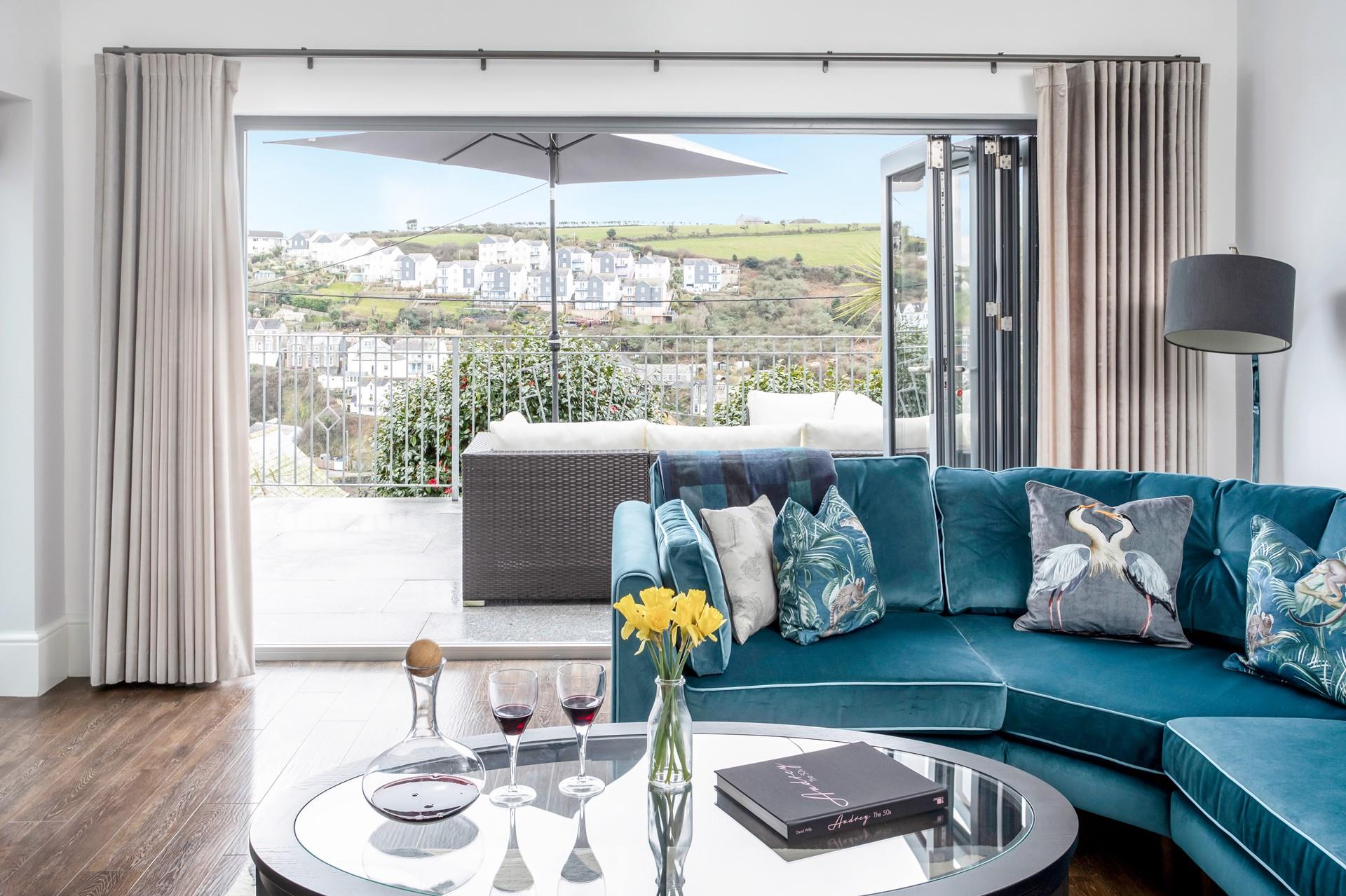 Open the bi-fold doors and let the fresh summer breeze run through the stylish home.