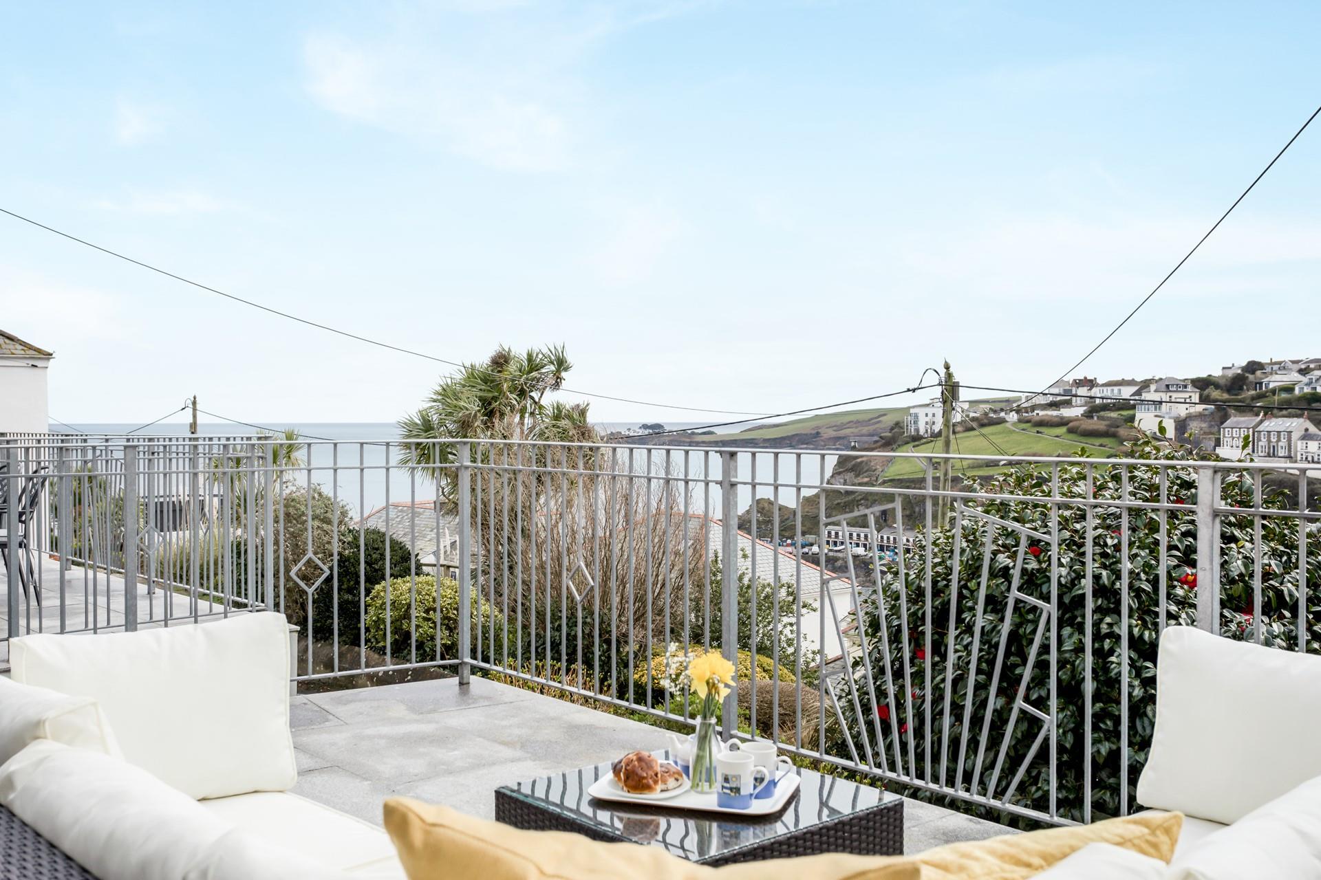 Sip your morning cuppa enjoying the sunrise over the harbour.