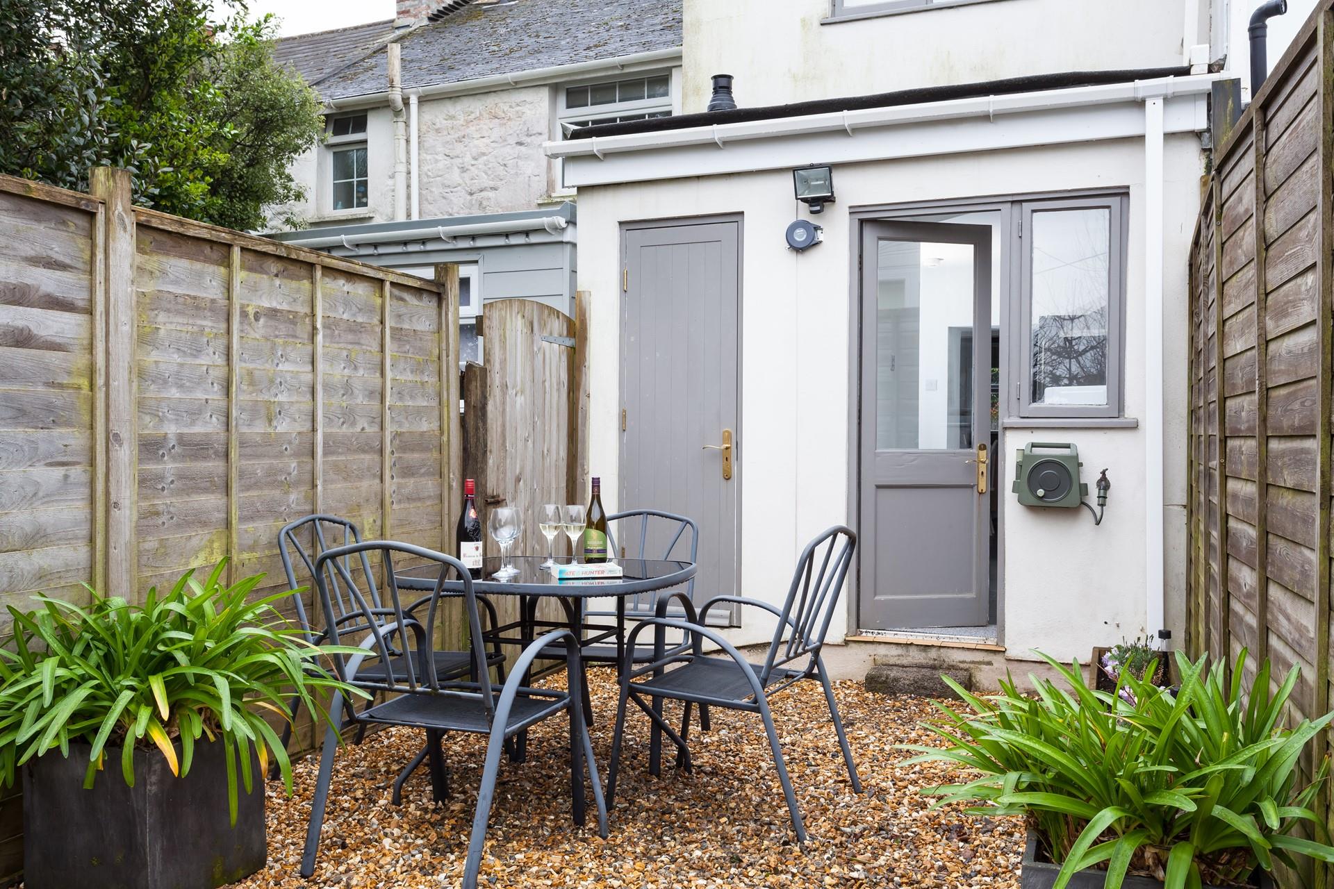 Watch your furry friend play in the garden while you relax in the sunshine.