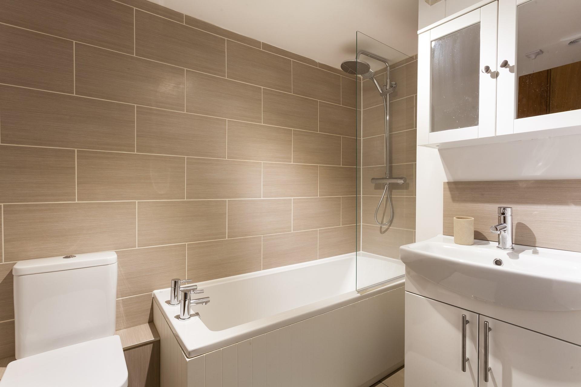 Wash off sandy toes in the bathroom after spending the day on the beach.