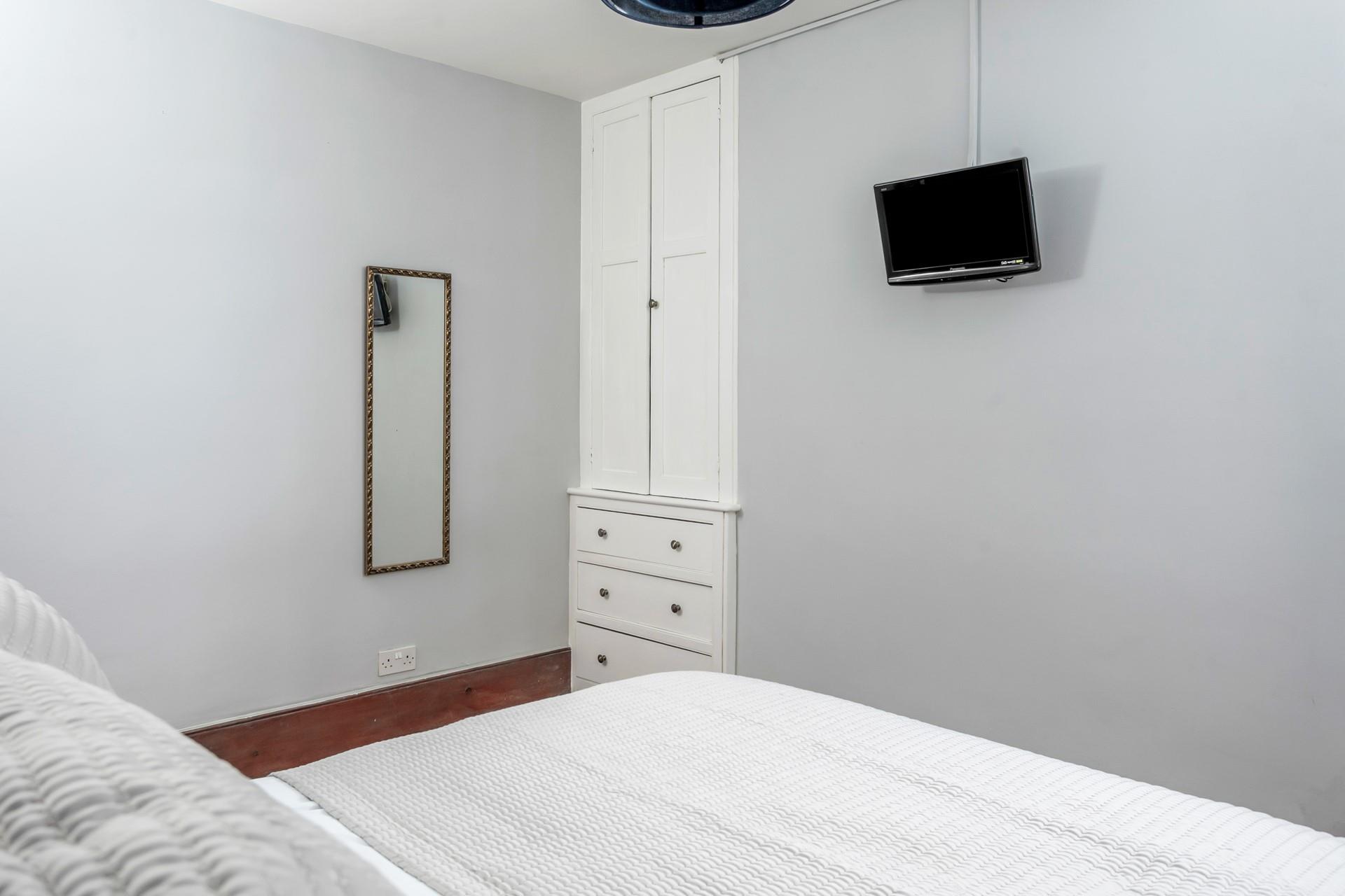 Pack away your suitcase into the large wardrobe when you arrive.