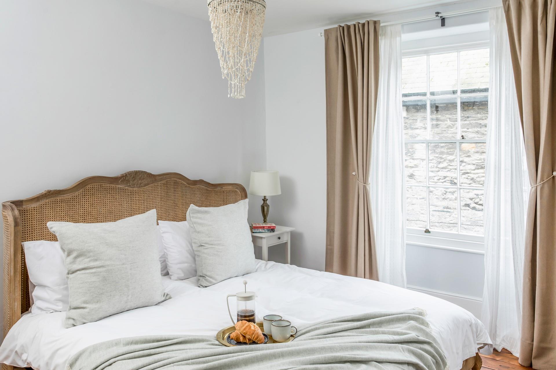 Bedroom 1 has a luxurious super king size bed for savouring lazy mornings.