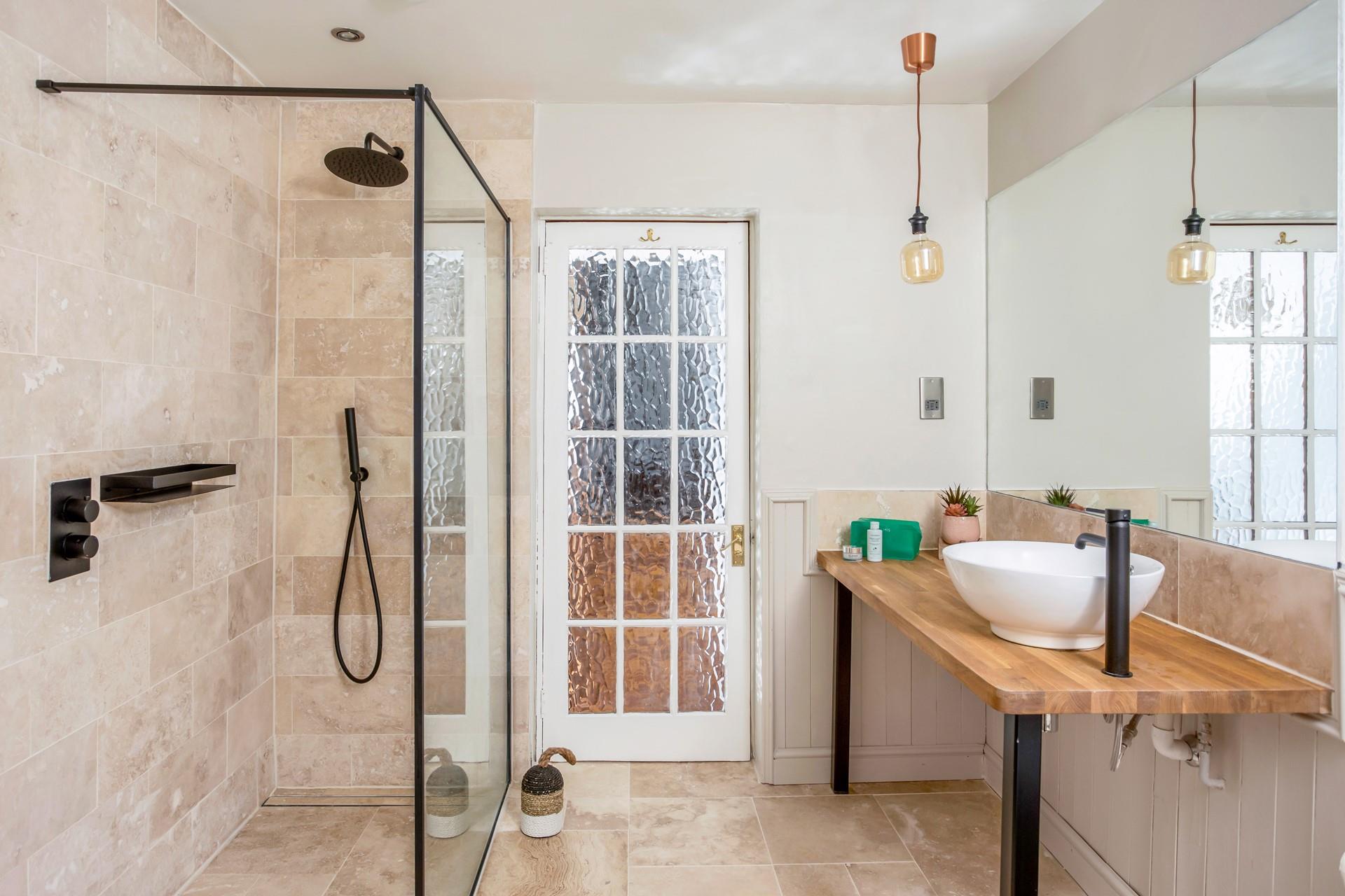 Start the day with an invigorating morning shower in the stylish garden.