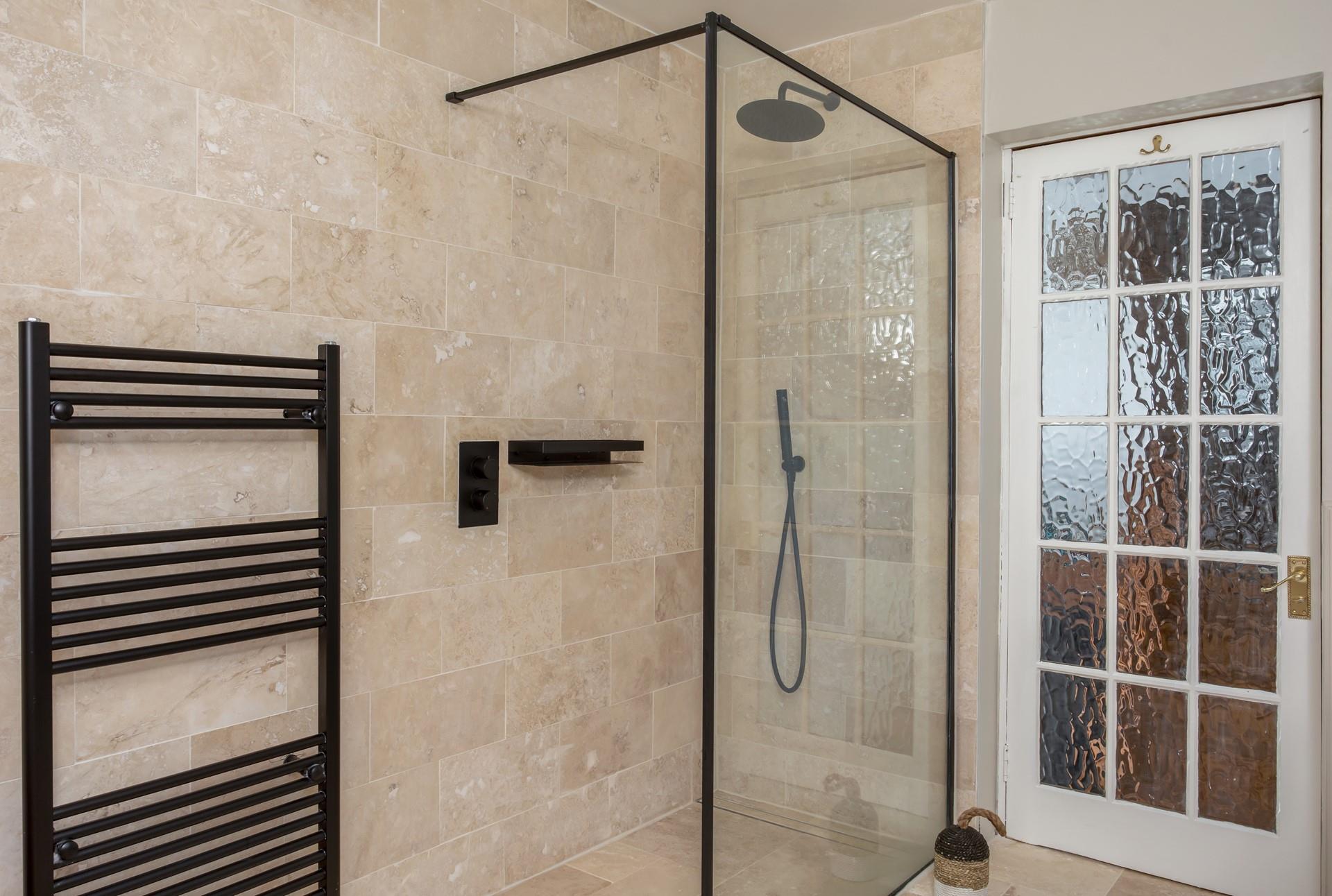 Warm fluffy towels taken straight from the heated towel rail are a dream after a luxurious rainfall shower.