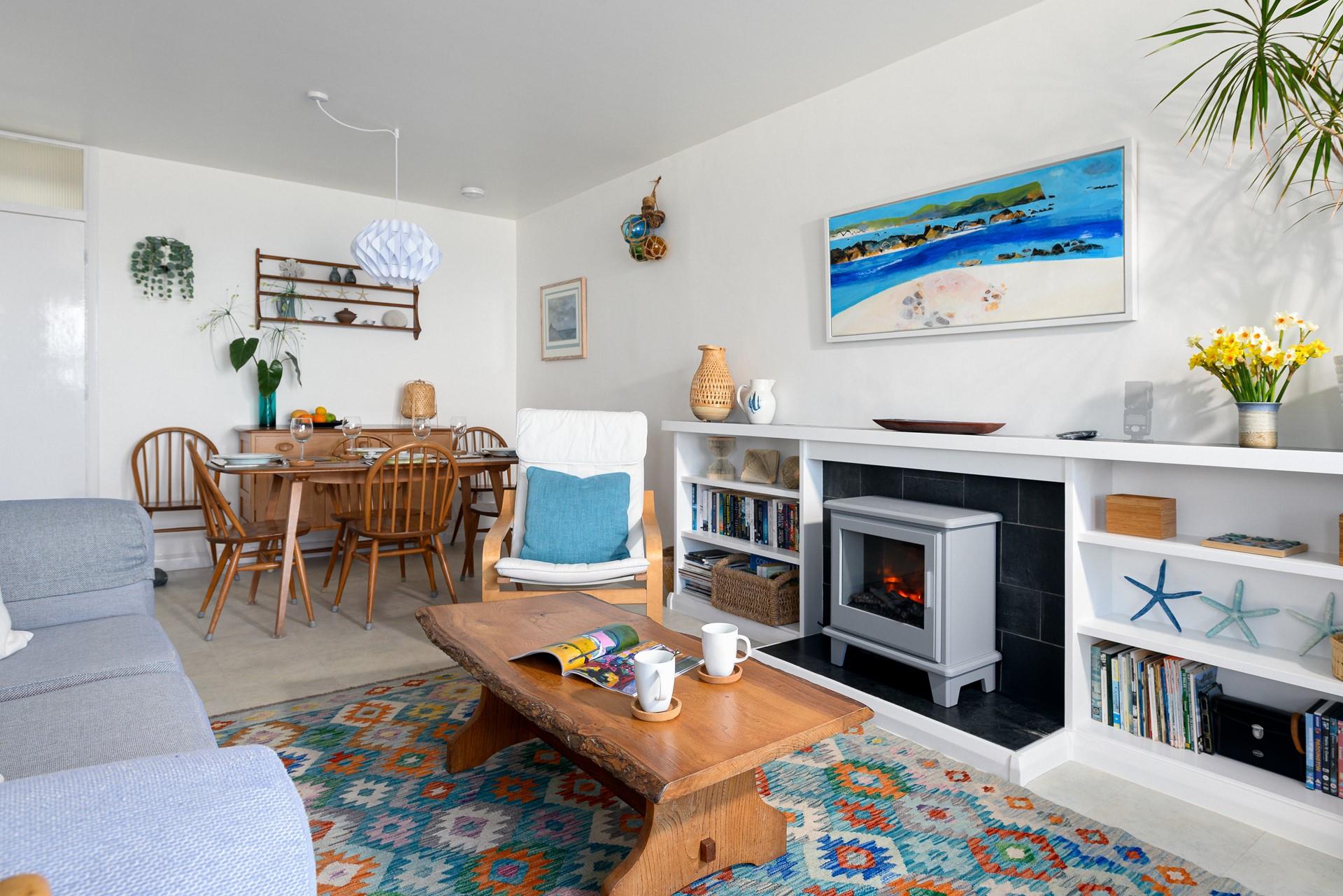 The sitting room is colourful and filled with light, the perfect beachside apartment.
