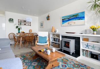 The sitting room is colourful and filled with light, the perfect beachside apartment.