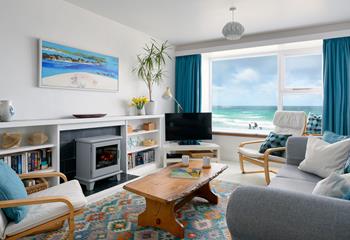 Sit and enjoy the waves rolling onto shore, you don't even need to leave the apartment with those views!