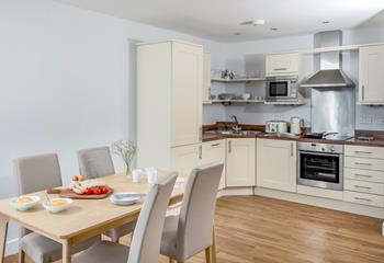 Cook up a delicious meal and dine in the spacious open plan living space.