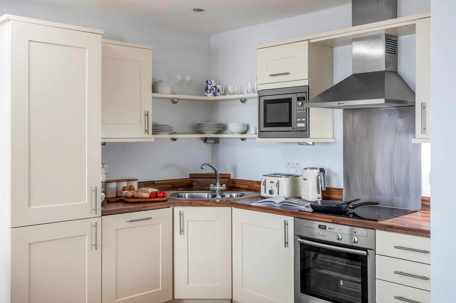 The kitchen is modern and well-equipped for cooking up a storm.