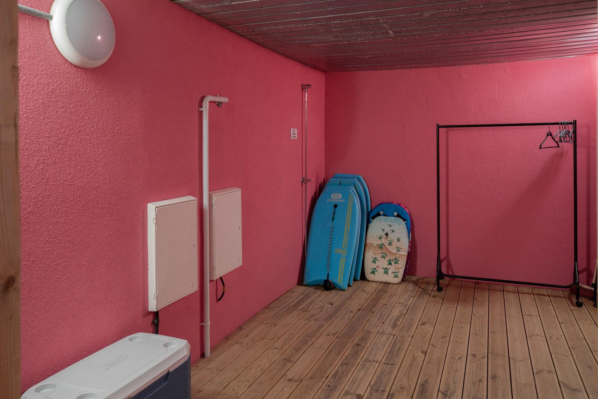 This handy area is great for storing wetsuits and boards!