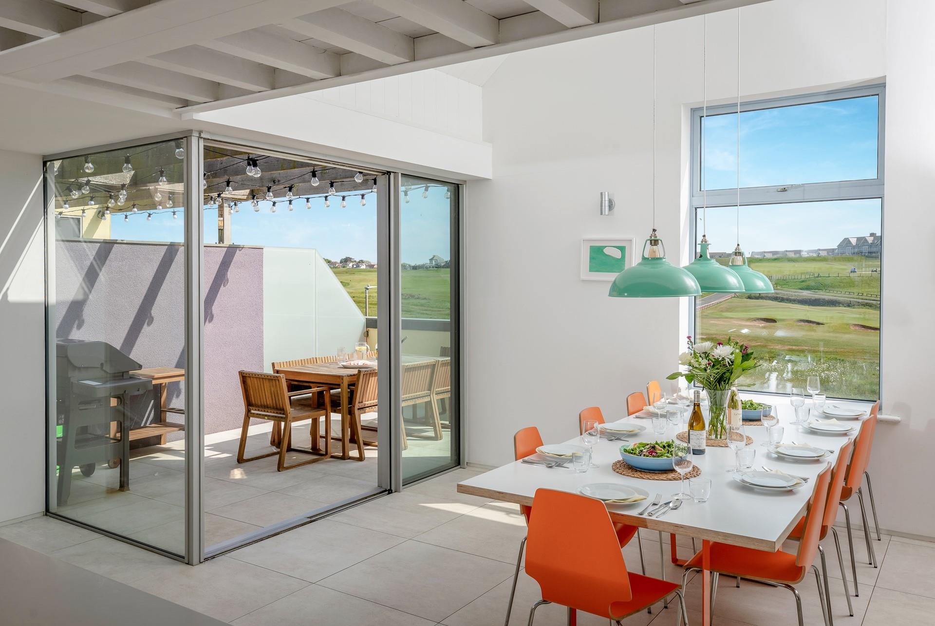 Enjoy a meal overlooking the golf course.