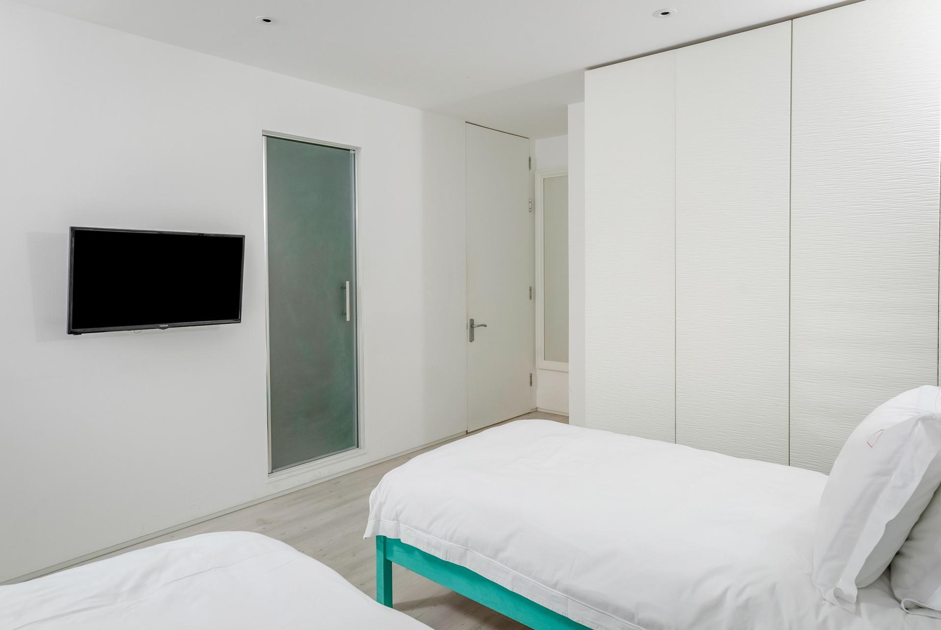 Tuck the little ones into the twin beds after a busy day.