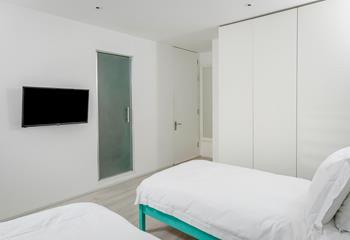 Tuck the little ones into the twin beds after a busy day.