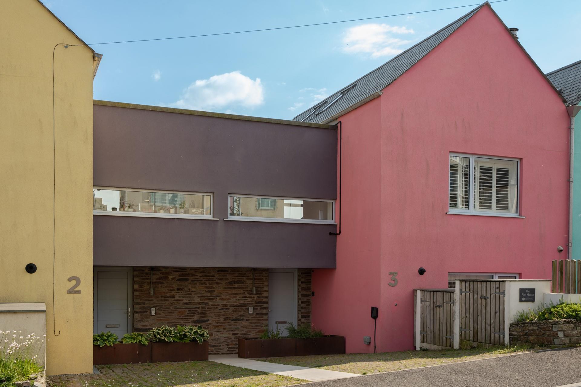 A cheerful welcome awaits you at The Pink House!