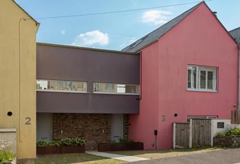 A cheerful welcome awaits you at The Pink House!