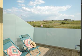Watch the sunset from the balcony each evening.