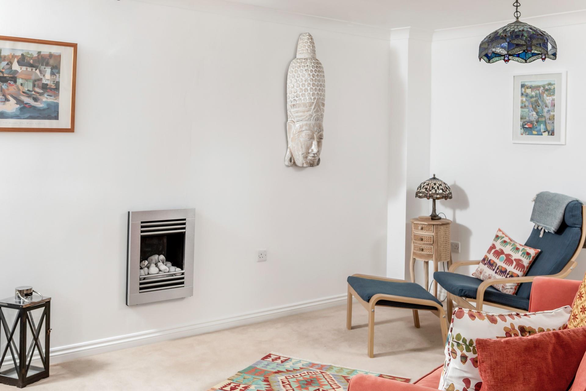 The sitting room has bright interiors making for the perfect space to relax.