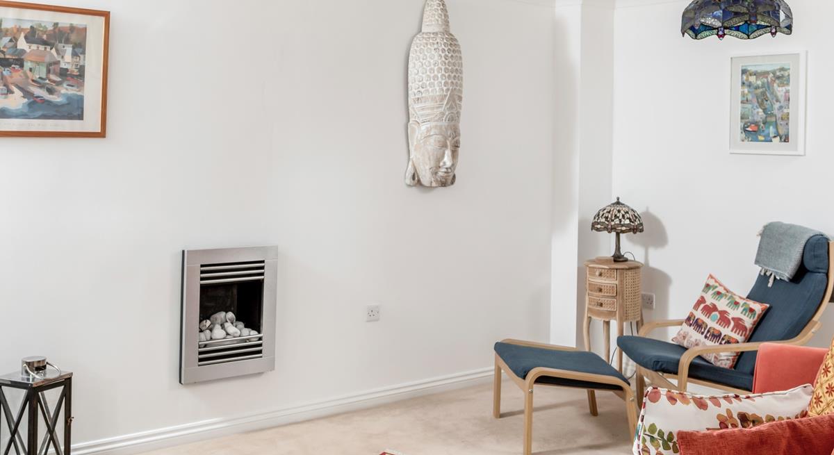 The sitting room has bright interiors making for the perfect space to relax.