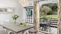 Open the patio doors and let the warm summer breeze run through the cottage.