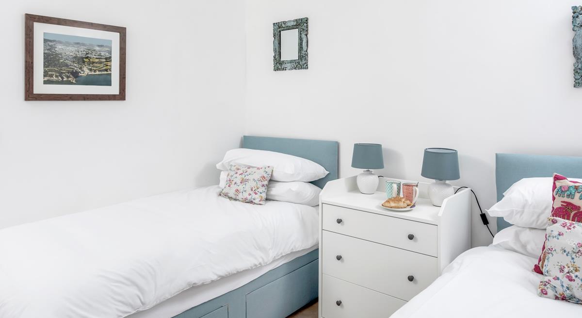 The twin beds are perfect for kids or adults, wake up and treat yourself to breakfast in bed!