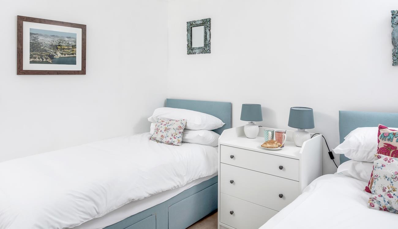 The twin beds are perfect for kids or adults, wake up and treat yourself to breakfast in bed!