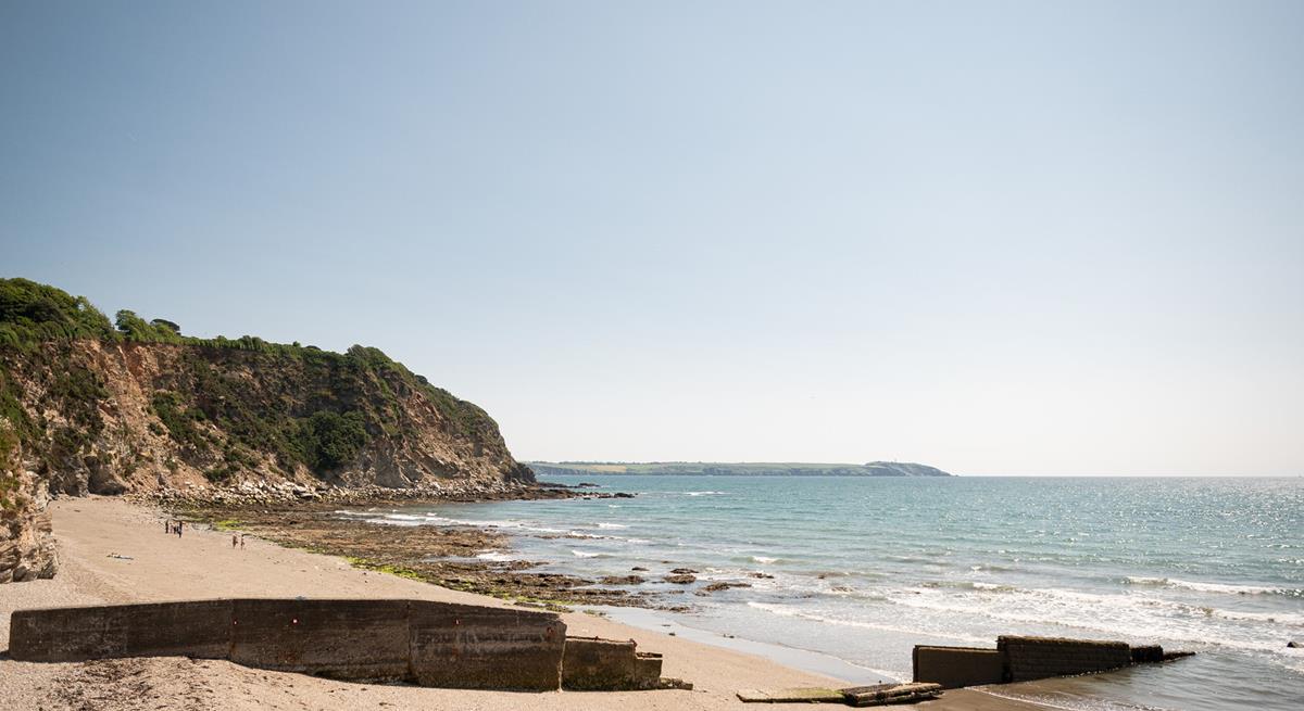 Relax on the sand and dip your toes in the turquoise water.