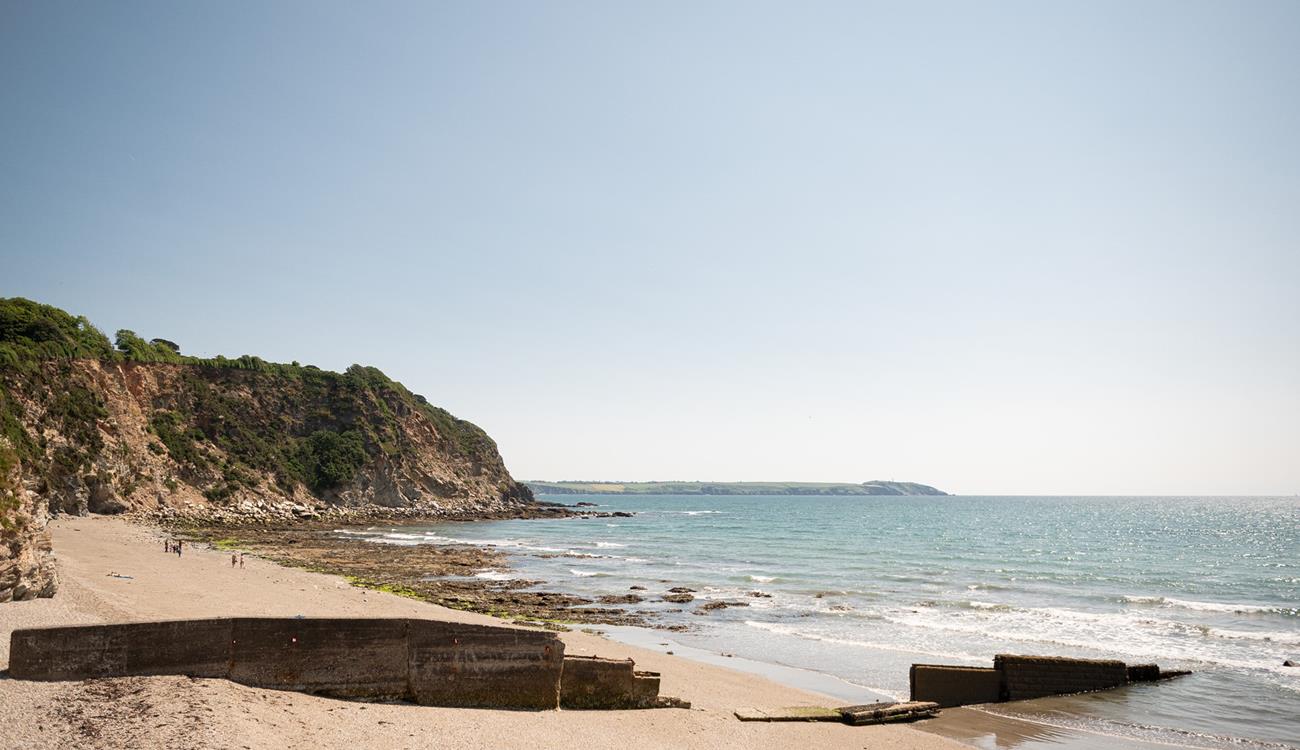 Relax on the sand and dip your toes in the turquoise water.