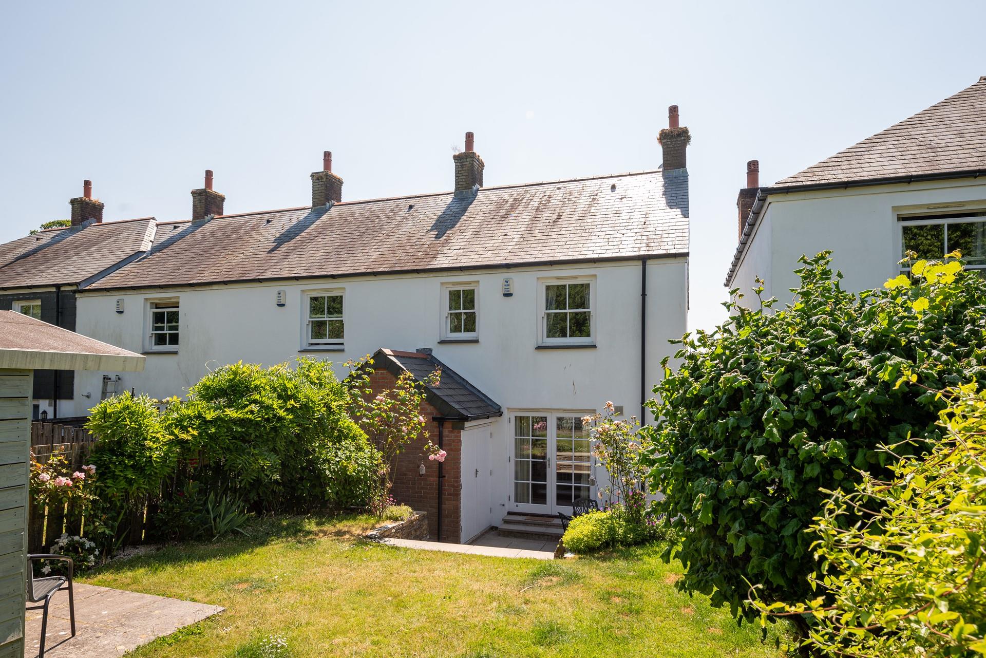 Let your furry friends run off some steam in the spacious garden.