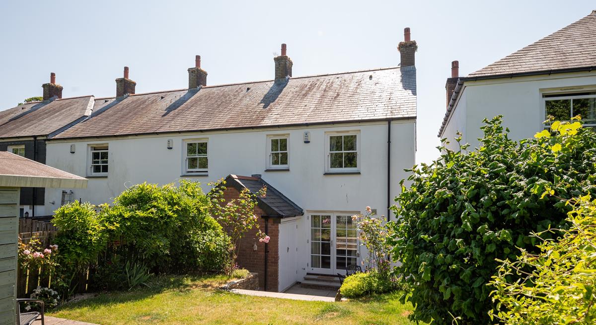 Let your furry friends run off some steam in the spacious garden.